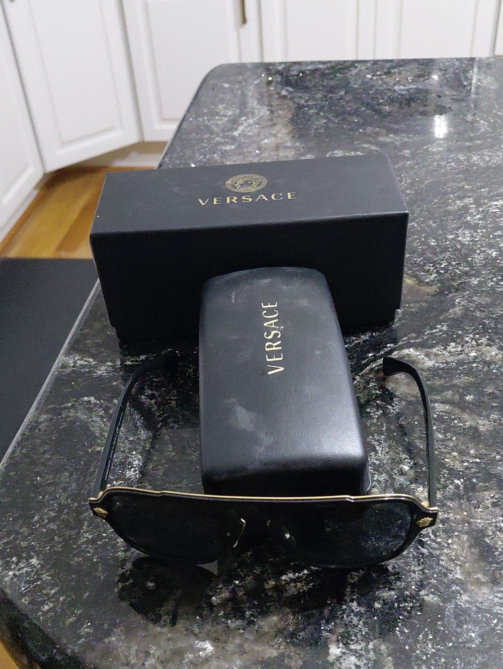 Versace Black and Gold Women's Sunglasses - Iconic Medusa Accent